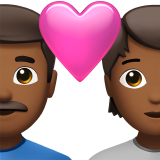 Par med hjerte: mand, person, medium-mørk hudfarve for Apple iOS 18.4