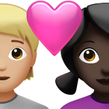 Pár se srdcem: Osoba, Žena, Středně světlý tón pleti, Tmavý tón pleti pro Apple iOS 18.4