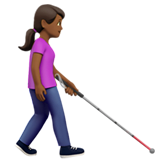 Žena s bílou holí směřující doprava: středně tmavý odstín pleti pro Apple iOS 18.4