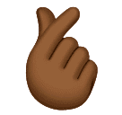 Hand met wijsvinger en duim gekruist: donkergetinte huidskleur voor Huawei HarmonyOS 4.0