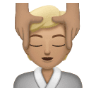 Persoon die hoofdmassage krijgt: lichtgetinte huidskleur voor Huawei HarmonyOS 4.0