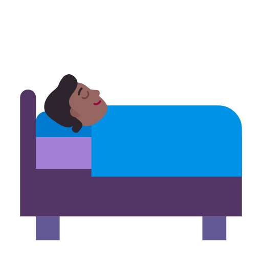 Person i seng: medium til mørk teint for Microsoft Windows 11 23H2 June 2024 Update